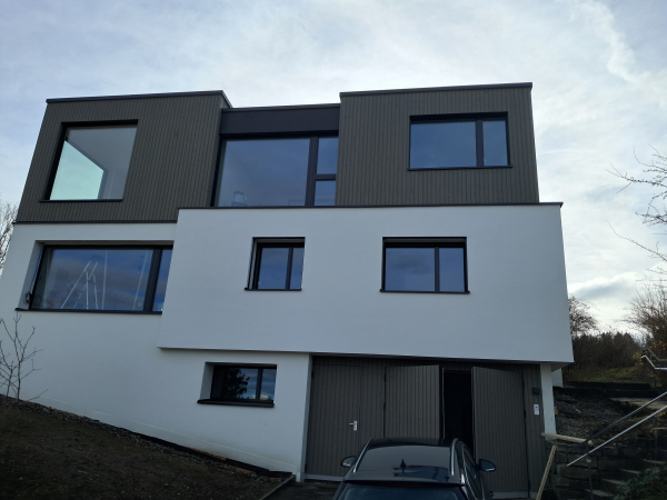 Dachaufstockung inkl. Fassadenverkleidung